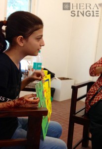 Fig. 3 A young girl showing us her map (Photo by Penn)