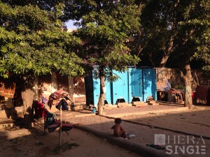 Fig. 8 A child playing near the washrooms in the shelter (Photo by Penn)